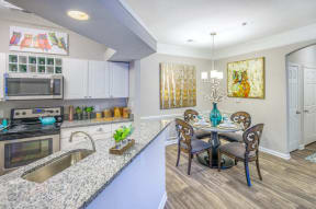 Lex at Brier Creek apartments in Morrisville, NC, model apartment kitchen and dining room