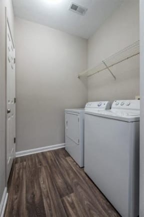 Lex at Brier Creek apartments in Morrisville, NC, laundry room with full-size washer and dryer