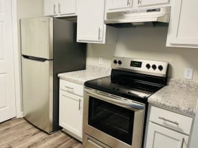 Stone Gate Apartments in Charlotte, NC, renovated kitchen with stainless appliances
