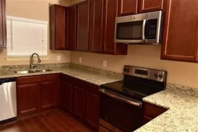 Congaree Villas, West Columbia South Carolina, stainless steel range and microwave