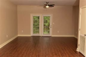 Congaree Villas, West Columbia South Carolina, apartment living room with hardwood floors and patio doors