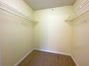 Stone Gate Apartments in Charlotte, NC spacious walk-in closet with shelving