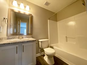 Stone Gate Apartments in Charlotte, NC renovated bathroom with upgraded fixtures