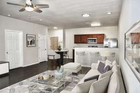 Living room, dining room and kitchen in a Cresta North Valley apartment in Albuquerque, NM