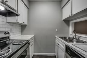 Fully Equipped Kitchen at Bellaire Oaks Apartments, Houston, TX
