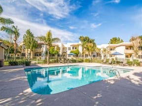 Apartments for Rent Phoenix - Village at Lakewood Sparkling Pool with Lounge Chairs