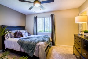 Apartments for Rent in Carlsbad CA-Santa Fe Ranch Carpeted Bedroom With Side Window And Ceiling Fan