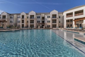 Relaxing Pool Area With Sundeck at McCarty Commons, San Marcos, TX
