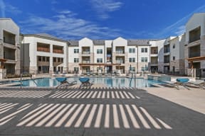 Poolside Sundeck With Relaxing Chairs at McCarty Commons, San Marcos, TX