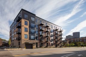 Full outside exterior view of The Whitley apartment building.