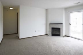 Large living spaces with fireplaces at Flatwater Apartments in La Vista, NE