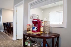 Community clubhouse with coffee maker at Northridge Apartments in Gretna, NE