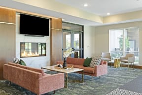 Fireside lounge at Nuvelo at Parkside Apartments in Apple Valley