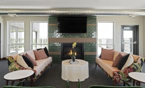 Cozy lounge and community space at Nuvelo at Parkside Apartments