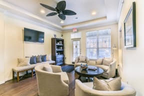 Cable Ready Living Room with Ceiling Fan at Aventura at Forest Park, St. Louis, MO