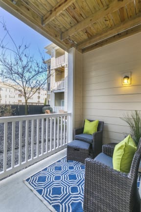 Renovated Patio Balcony with Seating at Aventura at Forest Park, St. Louis