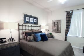 Two Bedroom Apartments in Chino Hills, CA - Missions at Chino Hills - Bedroom with Plush Carpeting and a Side Window