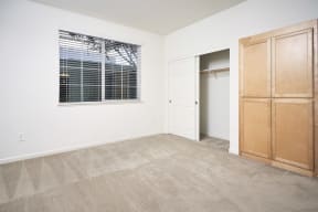 One Bedroom Apartments in San Jose, CA - Aviara Apartments Bedroom with Entrance to Patio and Spacious Layouts