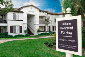 Resident parking sign and building exterior