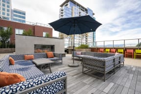 San Jose Apartments for Rent - Centerra Rooftop Social Lounge with Fireplace and Cozy Seating Areas Overlooking the City