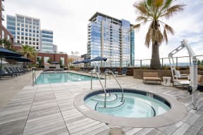 Outdoor pool and jacuzzi with pool lifts