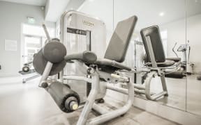 Fitness center with weight machine
