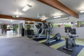 Apartments Palo Alto CA - Expansive Fitness Center Featuring Various Gym Equipment
