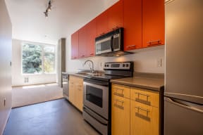 stainless steel appliances at Mural Apartments in Seattle, WA 98116