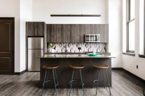Fitted Kitchen With Island Dining at The May, Cleveland, 44114