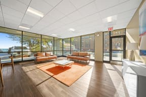 Leasing office with couch seating at 7251 at Waters Edge, Chicago, IL, 60649