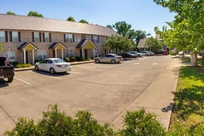 Dana Downs Apartments On-Site Parking with Ample Spaces and Landscaped Surroundings