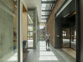 Hallway With Large Windows and Doors in Co-Working Space at 10 Clay Apartments in Seattle, WA, 98121