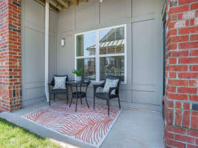 Spacious Pointe at Prosperity Village Patio With Sitting Arrangements in Charlotte Apartment Homes