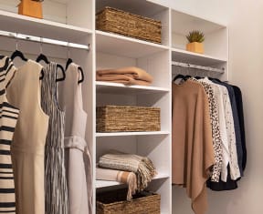 Walk-in closet with built in shelving at North+Vine, Chicago, IL, 60610