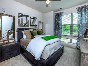 Spacious Berewick Pointe Bedroom With Comfortable Bed in Charlotte, NC Apartment Homes for Rent