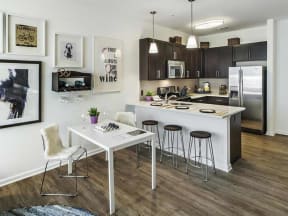 furnished apartment model dining room and kitchen