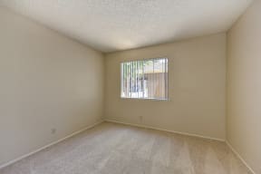 Guest Bedroom with Carpet, White Walls and Window with Blinds