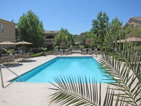 pool and lounge chairs  l Vineyard Gate Apartments in Roseville CA