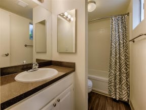 New Custom Designer Cabinetry and Countertops in Baths at Fountain Plaza Apartments, AZ, 85712