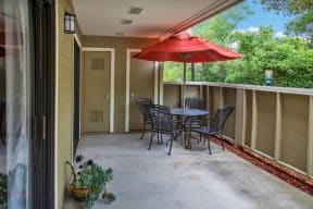 Patio with table and chairs Apts for rent in Pittsburg, CA 94565 l Kirker Creek Apartments