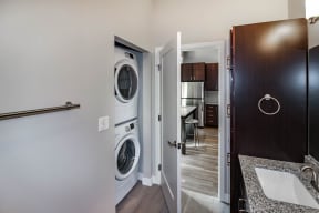 a bathroom with a washer and dryer