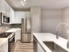 Chef-Inspired Kitchens Feature Stainless Steel Appliances at The MilTon Apartments