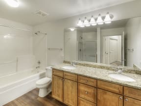 Bathroom With Extra Storage Space at The MilTon Luxury Apartments