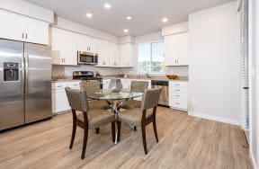 Apartments for Rent in American Canyon, CA - The Village at Vintage Ranch Apartments - Kitchen with Stainless Steel Appliances and White Cabinetry