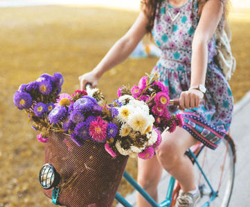 Bike with Flowers in Basket at Brookwood at Ridge, Ridge, New York