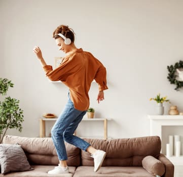 Girl dancing on couch 