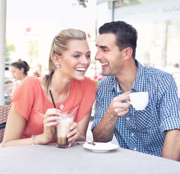 Couple having coffee Sacramento Apartments for rent l La Provence Apartments 