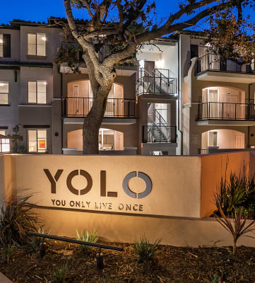 Yolo Apartments signage