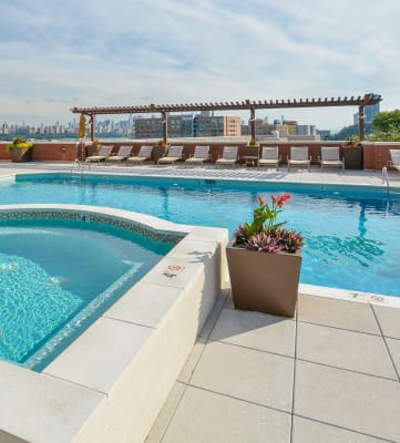 Extensive Resort Inspired Pool Deck at Riello Apartments Owner LLC, Edgewater, NJ, 07020