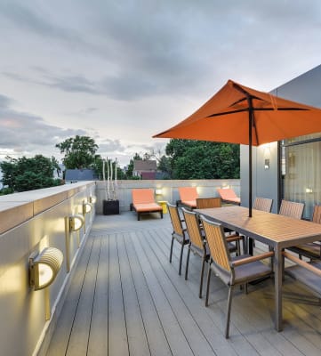 Rooftop Terrace with seating and dining space at Windsor at Maxwells Green, Somerville, MA